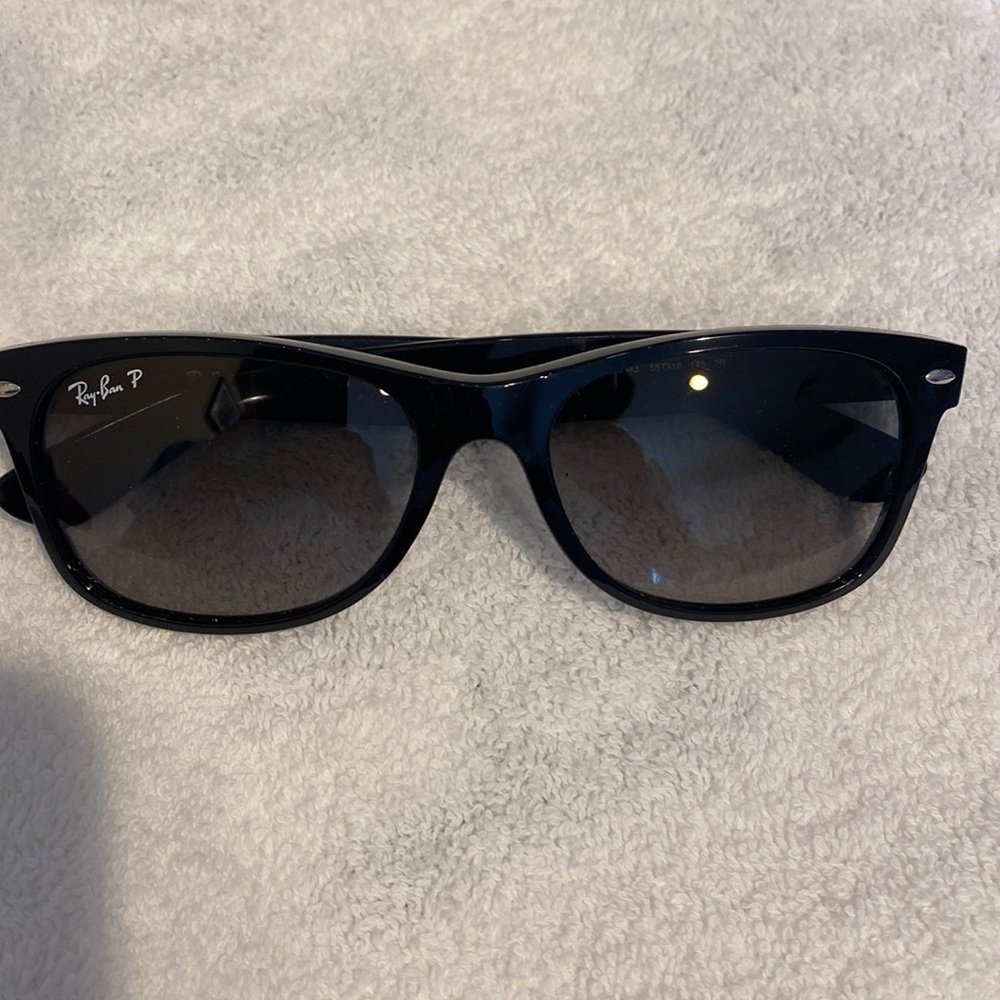 Ray Ban New Wayfarer- black - like new, polarized. Lenses in perfect condition.